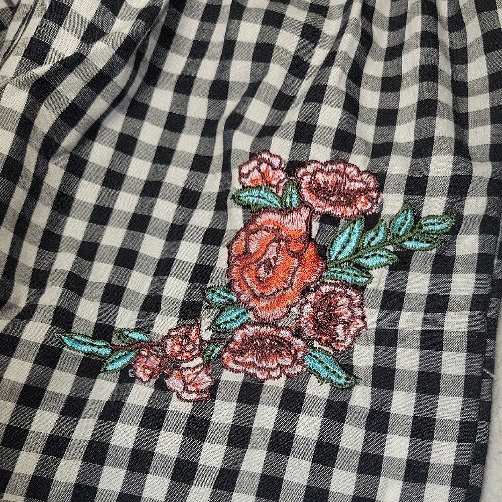 Charming Black and White Checkered Romper with Floral Detail - Picture 5 of 5